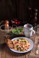 Scrambled eggs with tomatoes and spinach