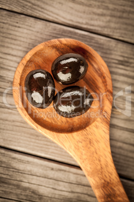 Olives on a wooden table