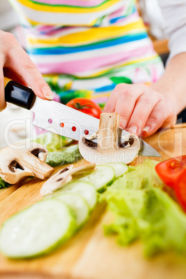 cutting mushroom champignon