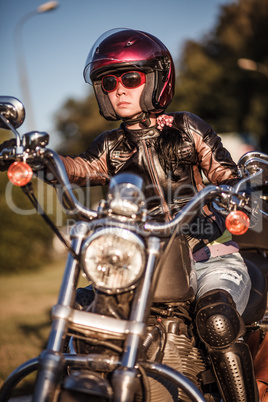 Biker girl on a motorcycle