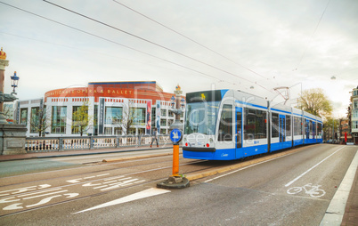 Tram near the Nationale opera and ballet building in Amsterdam