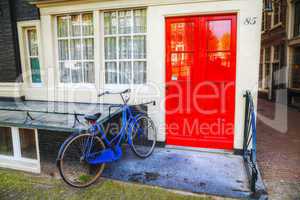 Bicycle parked near a house in Amsterdam