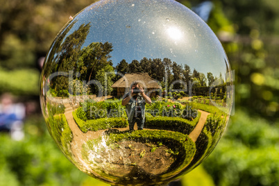 Selfie in a golden globe