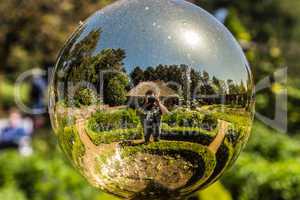 Selfie in a golden globe