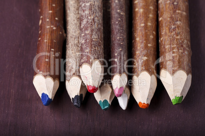 decorative pencil on a brown background