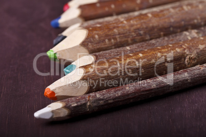 decorative pencil on a brown background