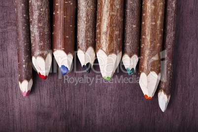 decorative pencil on a brown background