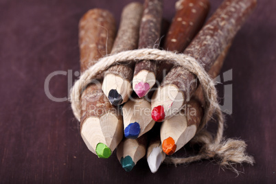 decorative pencil on a brown background