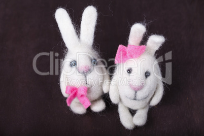 pair of white decorative bunnies