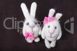 pair of white decorative bunnies