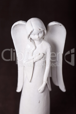 statuette of an angel in white