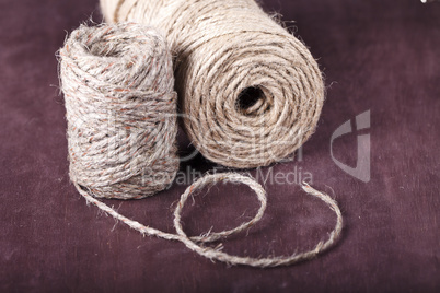 skein of twine on a brown background