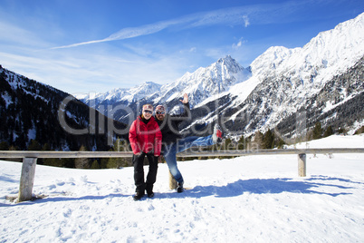 Happy couple in winter landscape