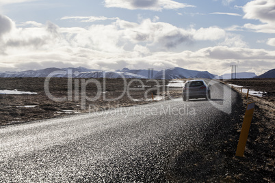 Car driving along the ring road in Iceland