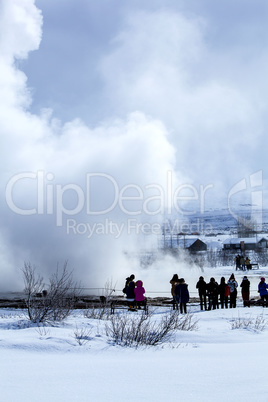 Visitors at the geyser erruption of Strokkur, Iceland