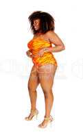 African woman in bikini in profile.