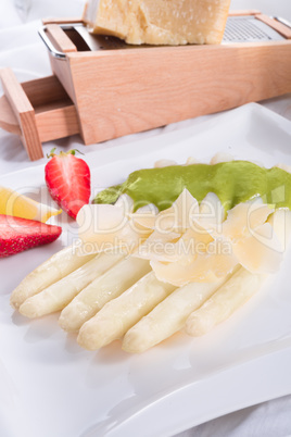 White asparagus with green sauce