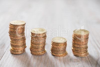 Coins stack in row