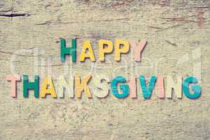 The colorful words "HAPPY THANKSGIVING"