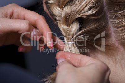 The master the hairdresser does a hairdress