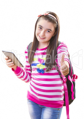 Beautiful teenager girl with backpack and digital tablet