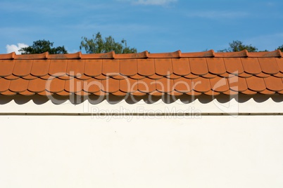 Wall with red roof