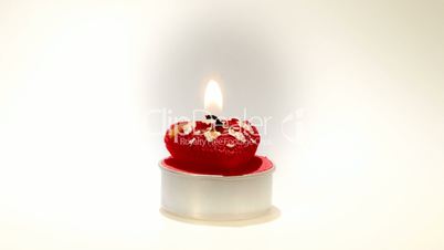 heart shape candle burning