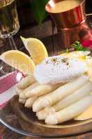 white asparagus served with a fine hollandaise sauce and Poache