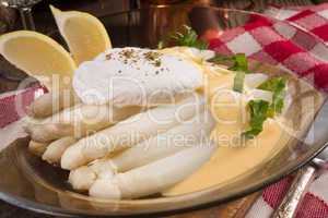 white asparagus served with a fine hollandaise sauce and Poache