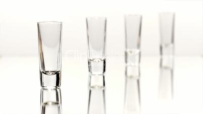 Row of Four Shot Glasses
