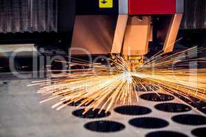 CNC Laser cutting of metal, modern industrial technology.