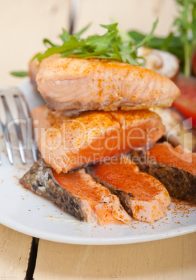 grilled samon filet with vegetables salad