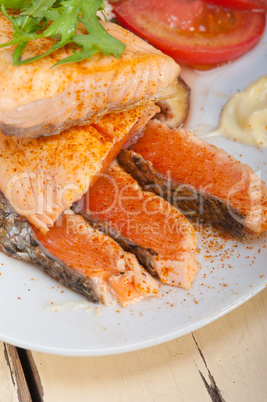 grilled samon filet with vegetables salad