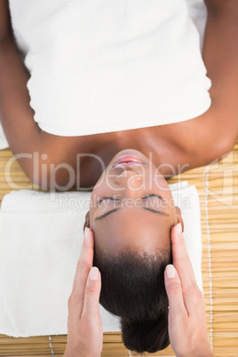 Pretty woman enjoying a head massage