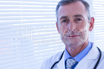 Confident male doctor looking at camera