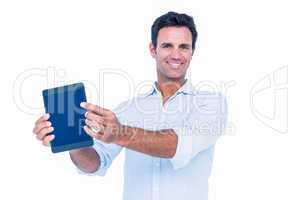 Handsome man holding tablet computer