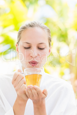 Attractive woman drinking tea