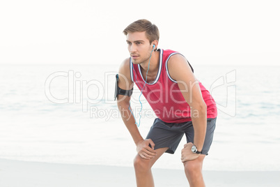Concentrate handsome runner doing break