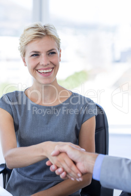 Businesswoman handshaking