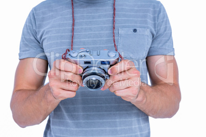 Close up view of man holding photo camera