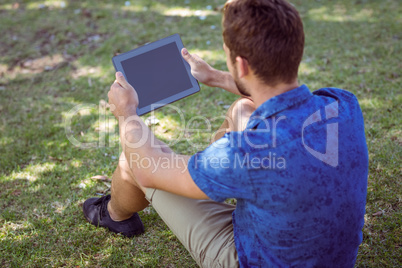 Young man using his tablet