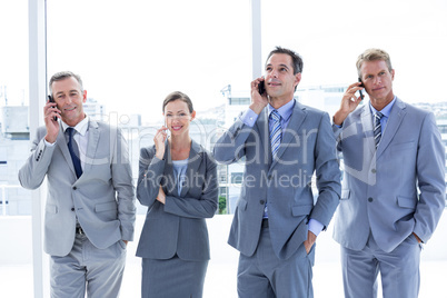 Employees using their mobile phone
