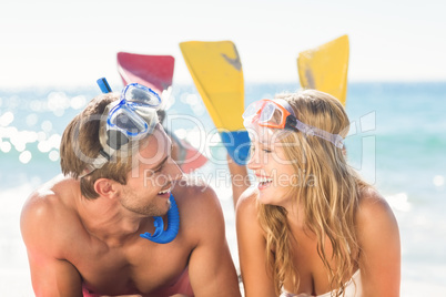 Happy couple with snorkel and flippers
