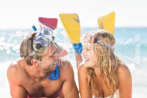 Happy couple with snorkel and flippers