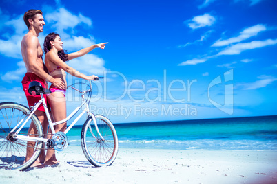 Happy couple going on a bike ride