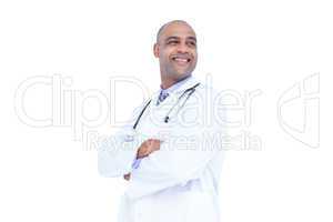 Smiling doctor with arms crossed looking away