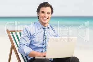 Businessman using his laptop