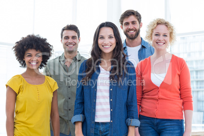 Group portrait of happy young colleagues