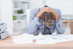 Businessman being depressed by working