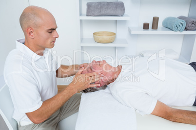 Man receiving head massage